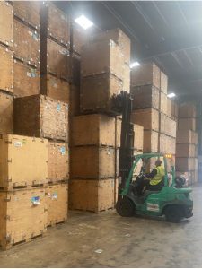 Forklift stacking seed boxes in warehouse - stacking 6 high